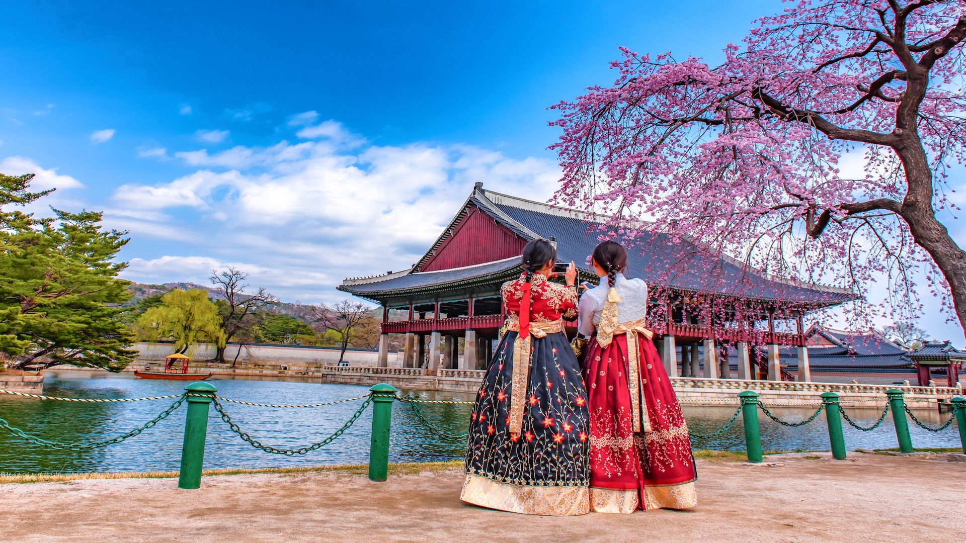 Korean girls dressed hanbok in traditional dress at gyeongbokgung palace in seoul south Korea